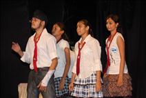 Students performing on stage