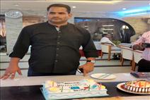 Director at Cake cutting ceremony